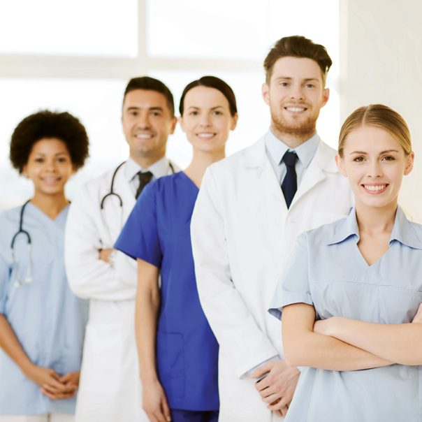 Medical professionals standing in a row.